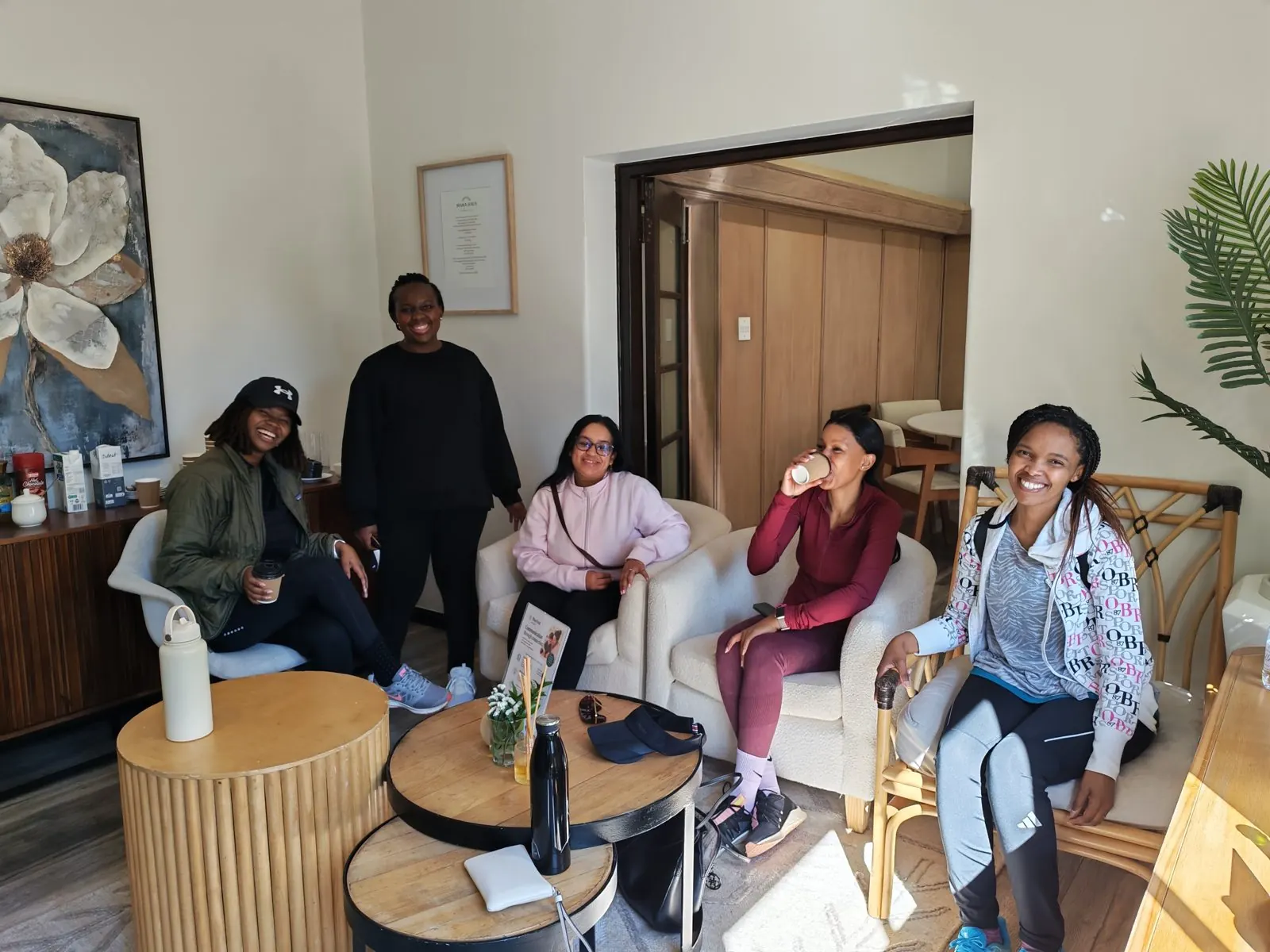 Mothers on the lounge sofas during a community event